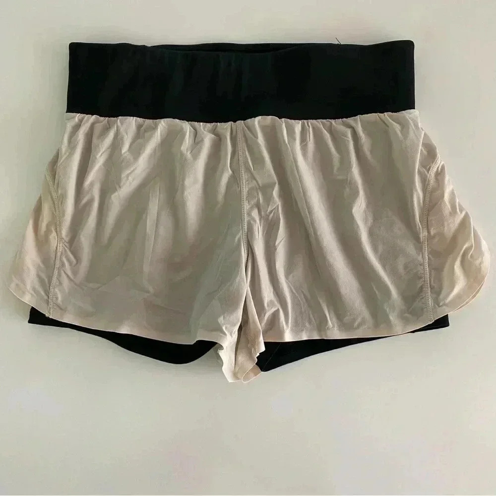 Fabletics Black with Semi Sheer Overlay Short with Black Tights Small